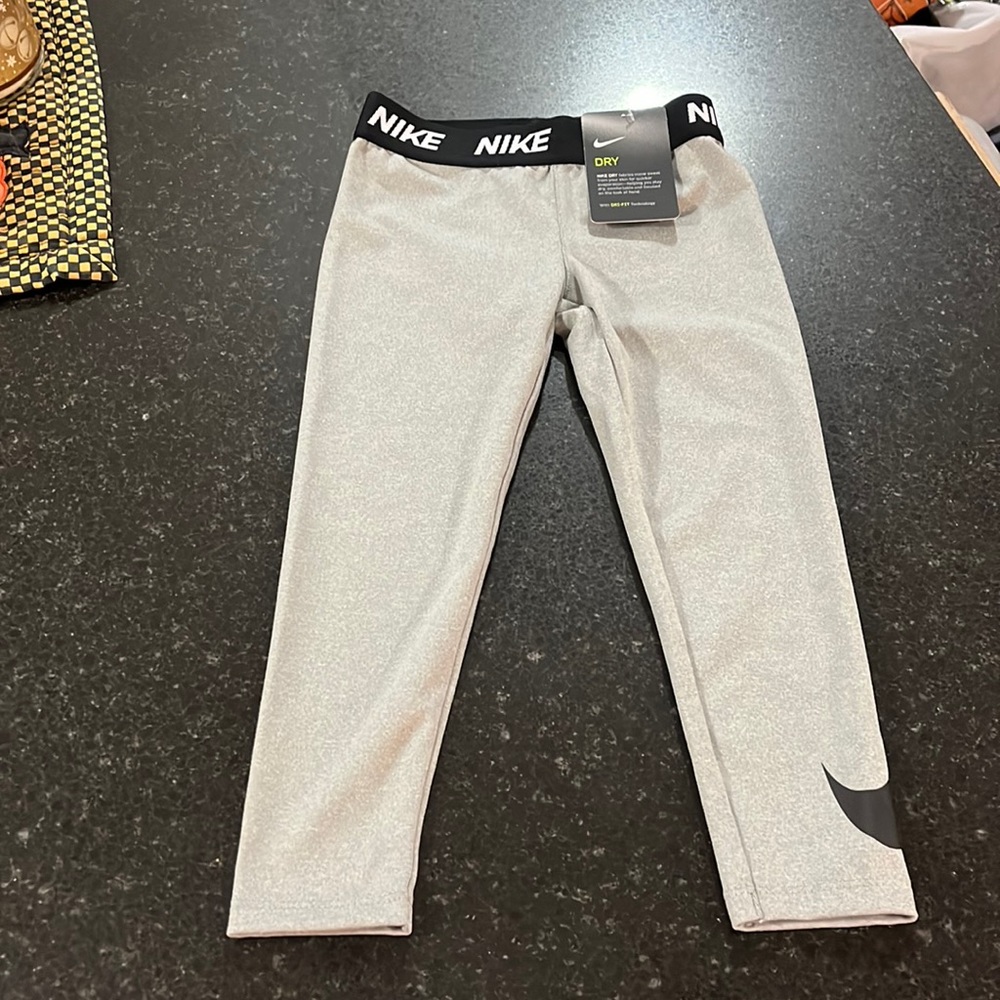Nike dry fit girl’s pants! SO CUTE with the hologram t-shirt!!
